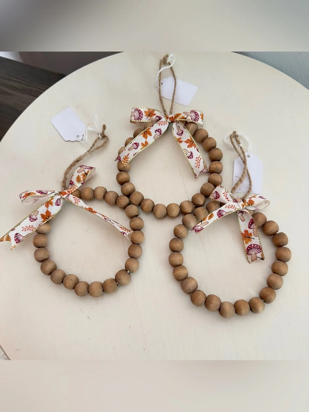 3 Handmade Wood Beaded Wreath Ornament With Mushroom Print Bow